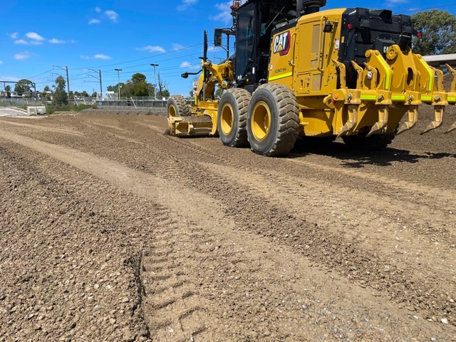 QCS CAT grader carrying out detailed road formation and earthworks